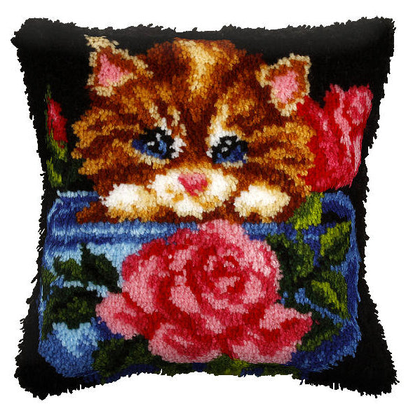 Finished latch hook cushion with floral cat design