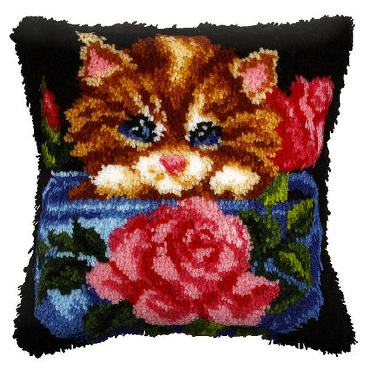 Finished latch hook cushion with floral cat design