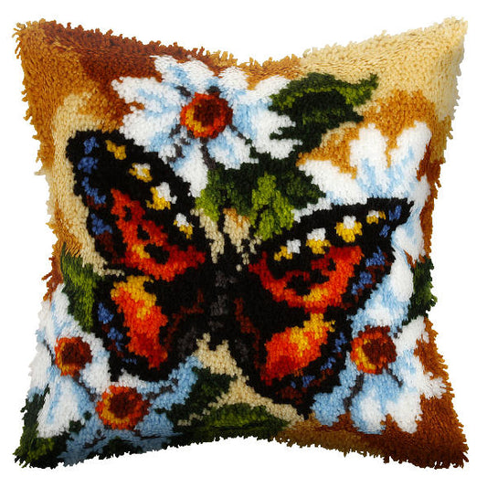 Finished latch hook cushion with butterfly design