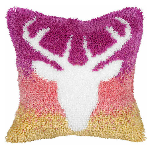 Finished latch hook cushion with stag design