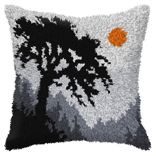 Finished Orchidea latch hook cushion showing a forest scene at night