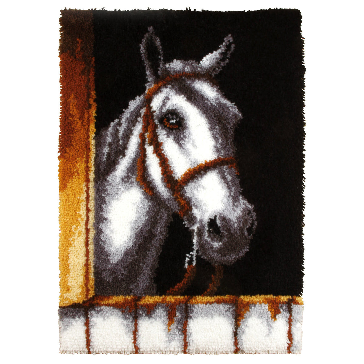 Finished Orchidea latch hook rug showing the head of a white horse