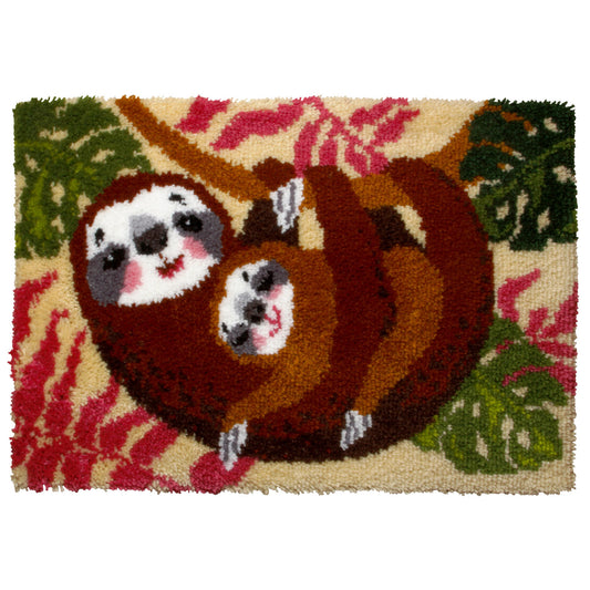 Finished Orchidea latch hook rug showing a family of sloths