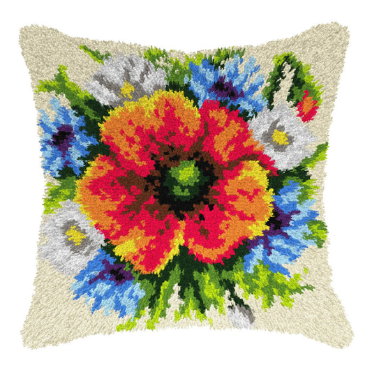 Finished Orchidea latch hook cushion showing a mix of wild flowers