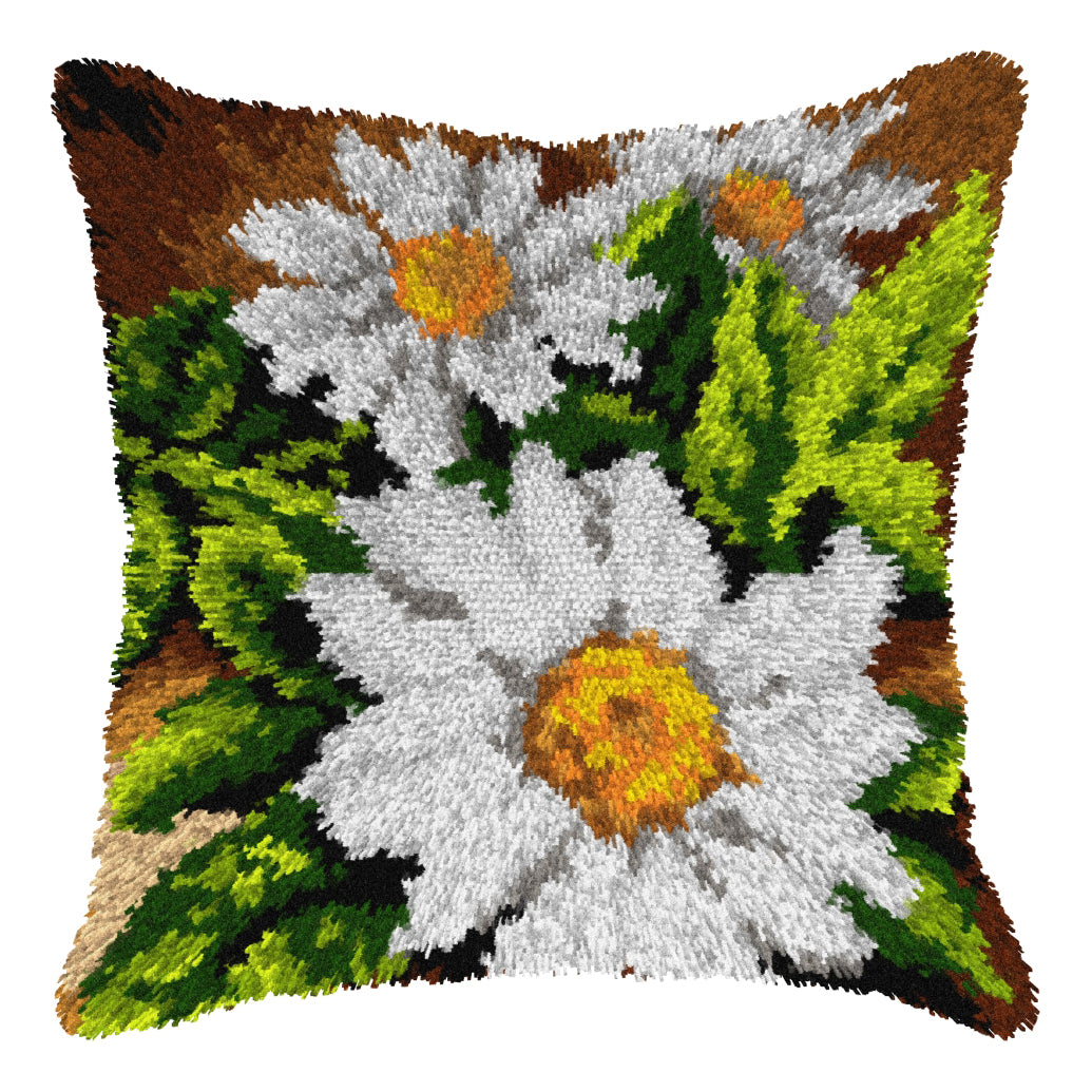 Finished Orchidea latch hook cushion showing white daisies