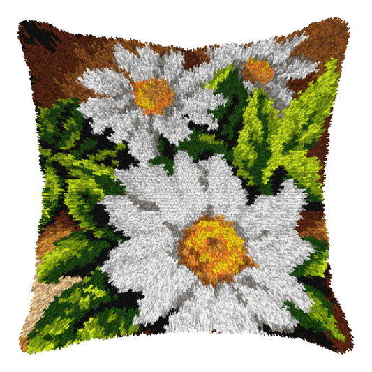 Finished Orchidea latch hook cushion showing white daisies