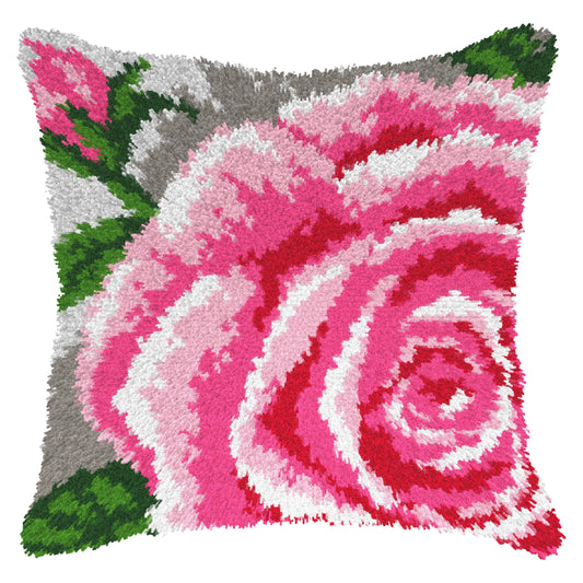 Finished Orchidea latch hook cushion showing a close-up of a large pink rose