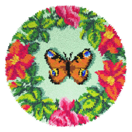 Finished Orchidea latch hook rug showing a butterfly