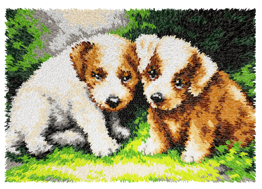 Finished Orchidea latch hook rug showing a group of puppies