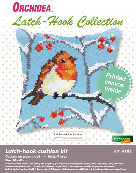 Finished Orchidea latch hook cushion showing a small bird in a winter scene