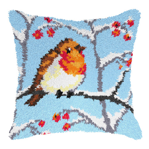 Finished Orchidea latch hook cushion showing a small bird in a winter scene
