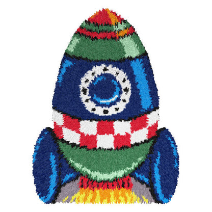 Orchidea latch hook rug kit showing a spaceship design