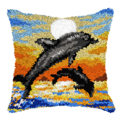 Orchidea latch hook cushion kit showing a dolphins design