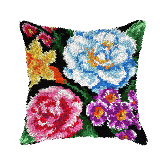 Orchidea latch hook cushion kit showing a flowers design