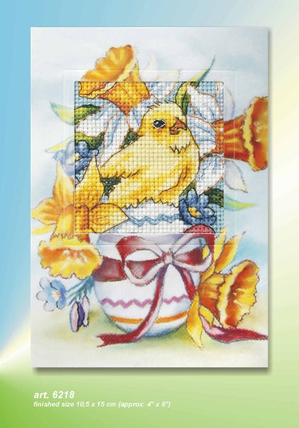 Cross stitch greetings card showing an Easter chick with an egg and daffodils