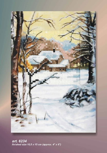 Cross stitch greetings card showing a winter scene