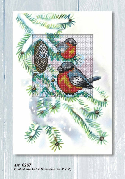 Cross stitch greetings card showing two bullfinches beside a pine cone on a snowy branch