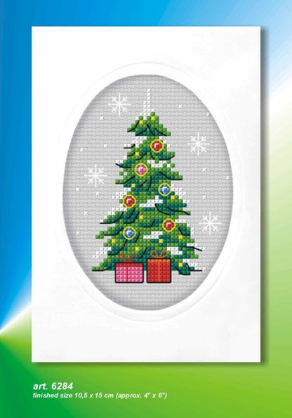 Cross stitch greetings card showing a decorated Christmas tree with presents in an oval frame