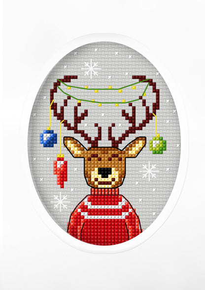 Cross stitch greetings card showing a reindeer