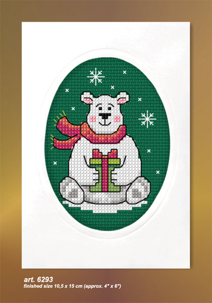 Cross stitch greetings card showing a Christmas bear on green fabric