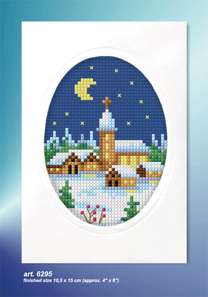 Cross stitch greetings card showing a church on navy fabric
