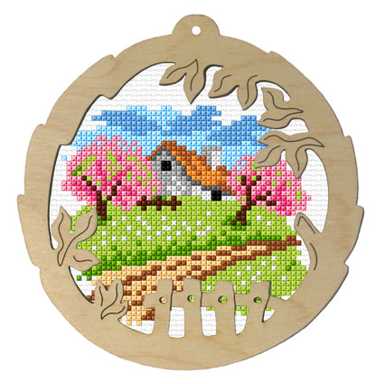 Orchidea cross stitch kit with a summer scene design in an engraved wooden frame