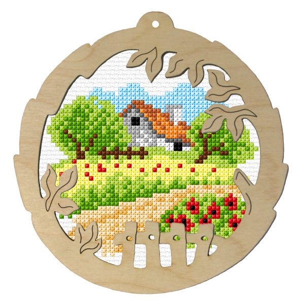 Orchidea cross stitch kit with a spring scene design in an engraved wooden frame