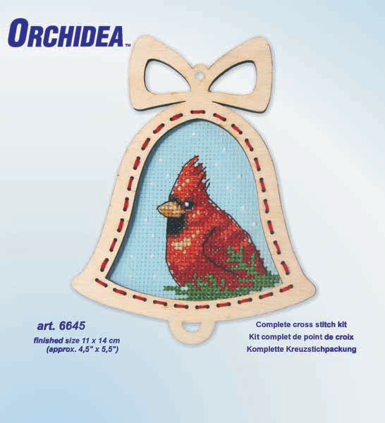 Orchidea cross stitch kit with a cardinal design in an engraved wooden bell-shaped frame