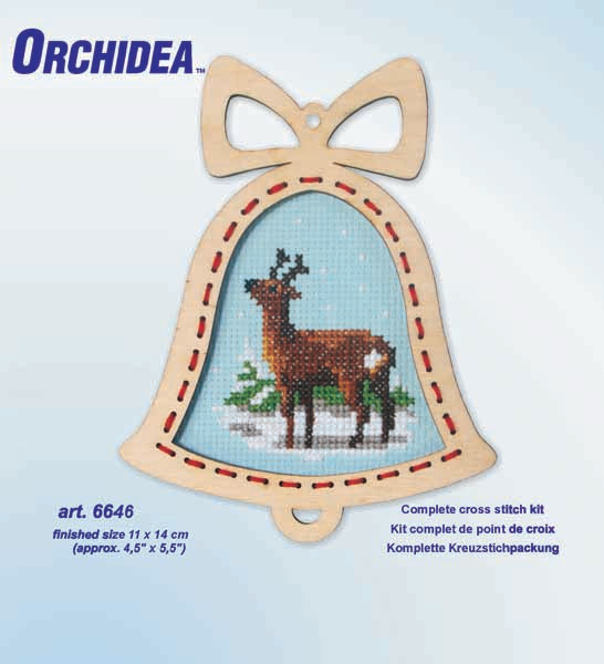 Orchidea cross stitch kit with a reindeer design in an engraved wooden bell-shaped frame