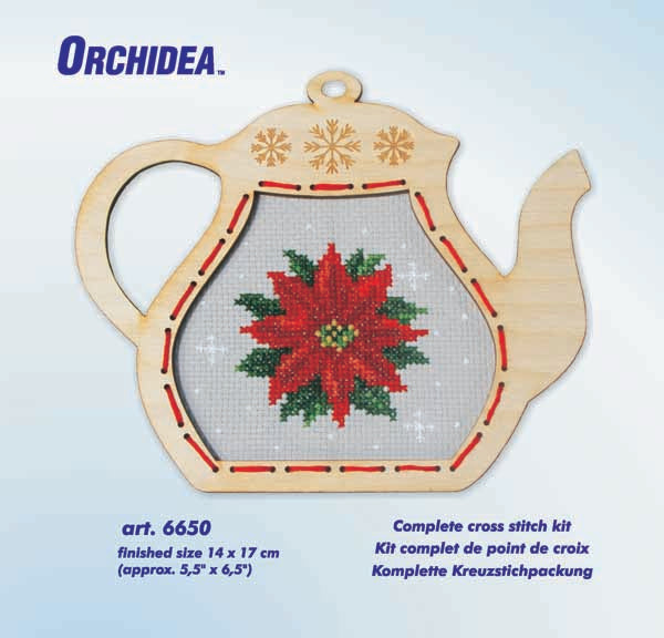 Orchidea cross stitch kit with a poinsettia design in an engraved wooden teapot-shaped frame