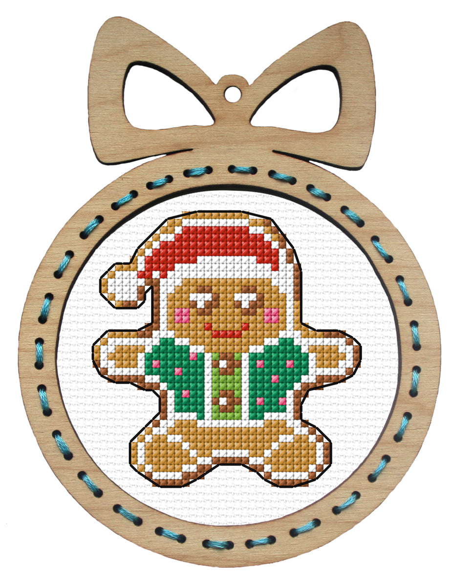 Orchidea gingerbread man cross stitch kit in a plywood frame