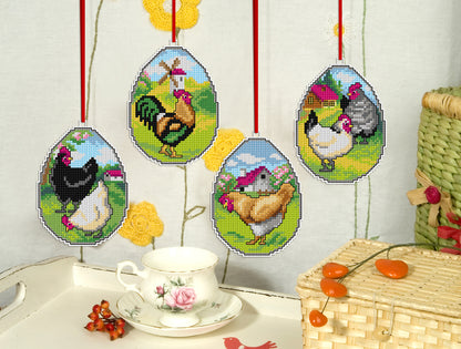 Set of 4 cross stitched hen and egg decorations on white plastic canvas