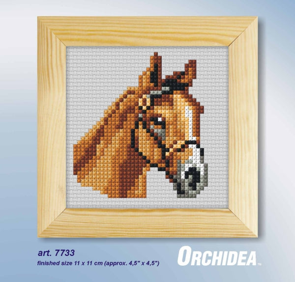 Cross stitched horse design in a round wooden frame