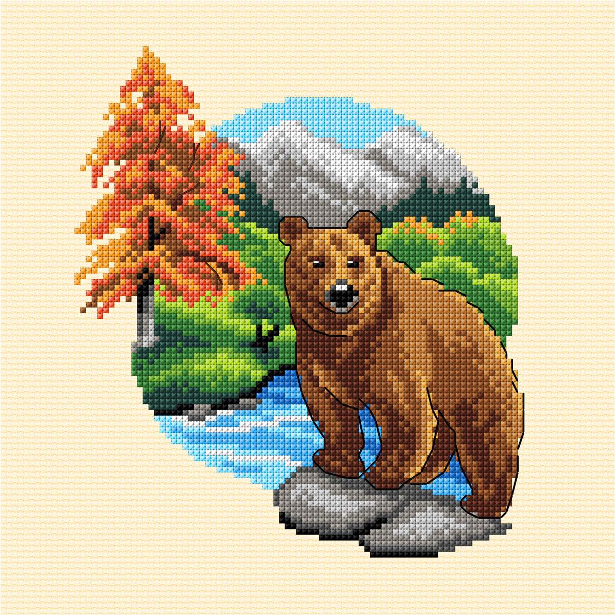 Cross stitch picture of a bear on cream fabric