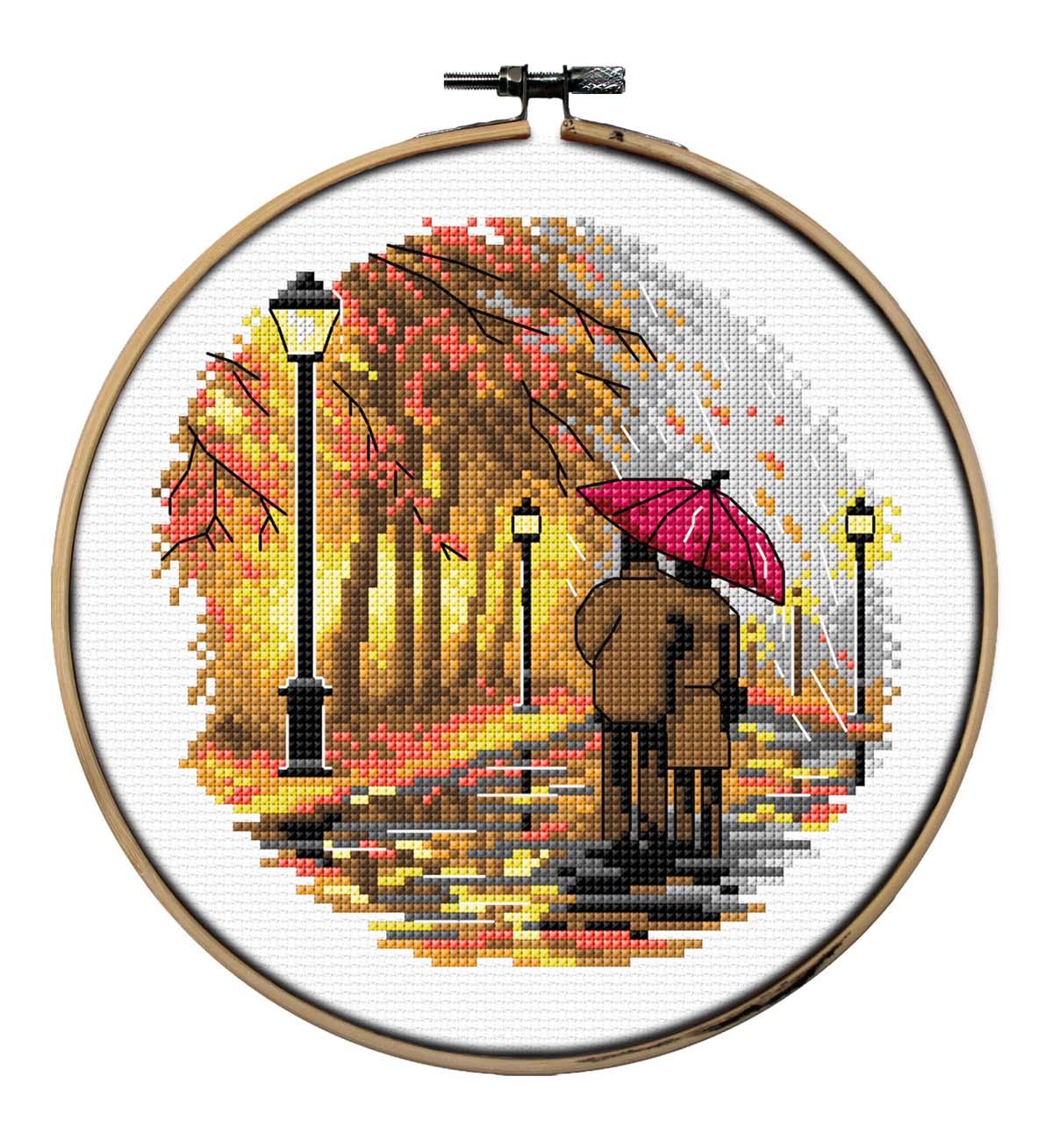 Orchidea walk in the rain cross stitch in an embroidery hoop
