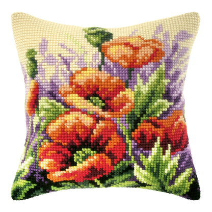 Cross stitched cushion with a poppies in meadow design