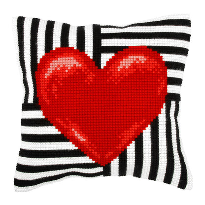 Finished cross stitch cushion with a red heart design