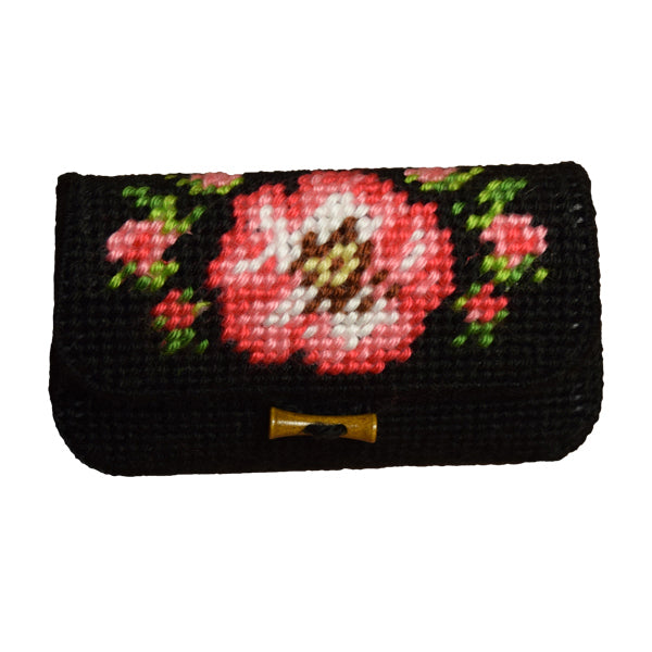 Needlepoint clutch bag with a wild rose pattern and wooden button