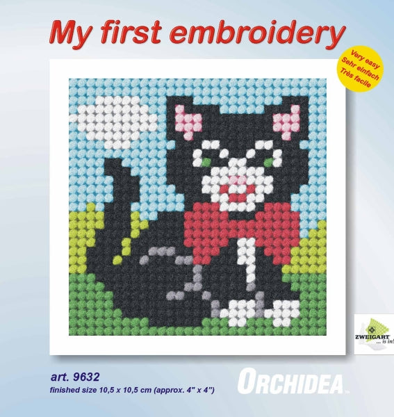 Finished beginner's needlepoint picture showing a kitten