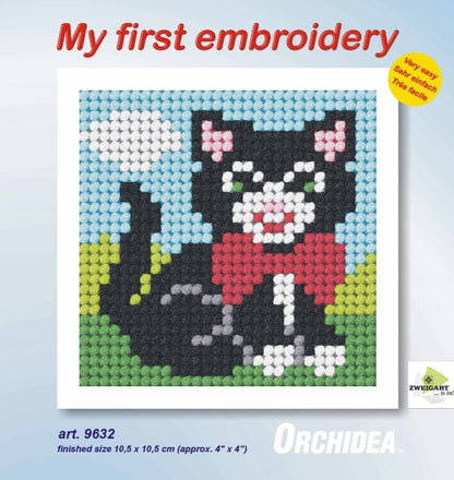 Finished beginner's needlepoint picture showing a kitten
