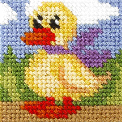 Finished beginner's needlepoint picture showing a duck