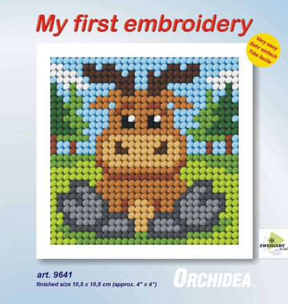 Finished beginner's needlepoint picture showing a reindeer