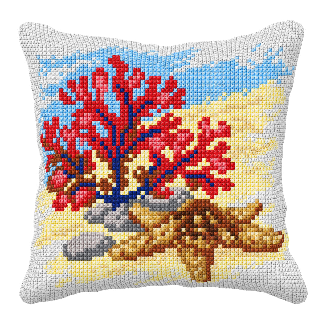Orchidea cross stitch cushion showing coral and starfish