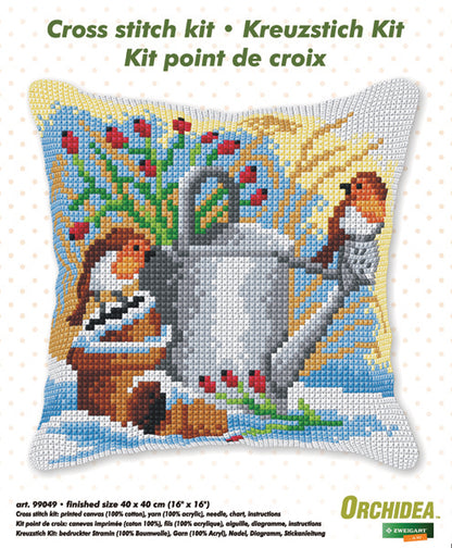 Orchidea cross stitch cushion showing birds perched on a watering can