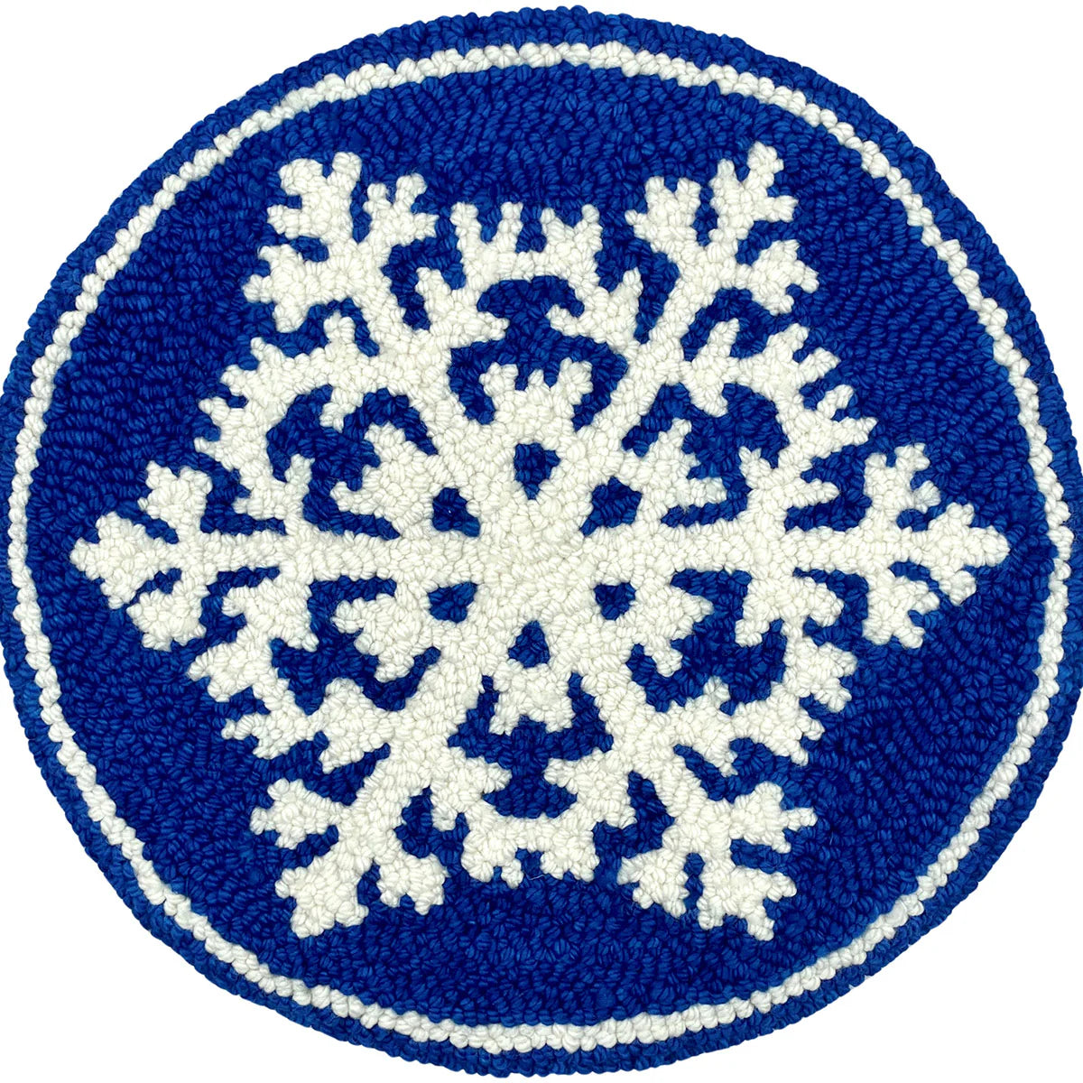 Finished snowflake punch needle design in wool yarn