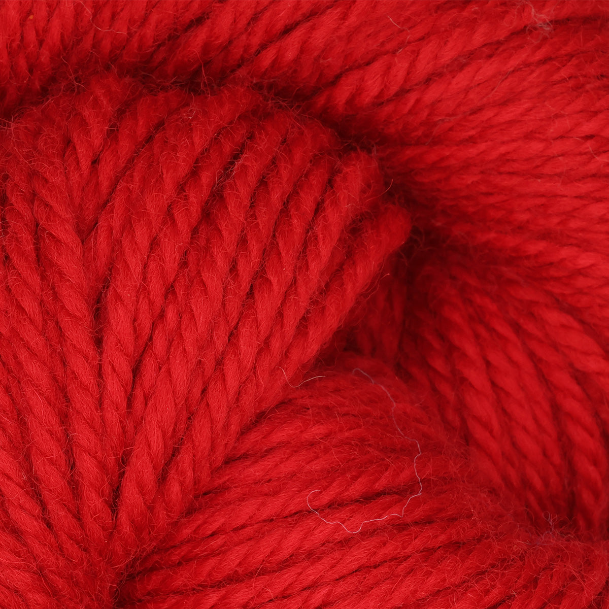 Skein of be mine hand-dyed wool punch needle yarn