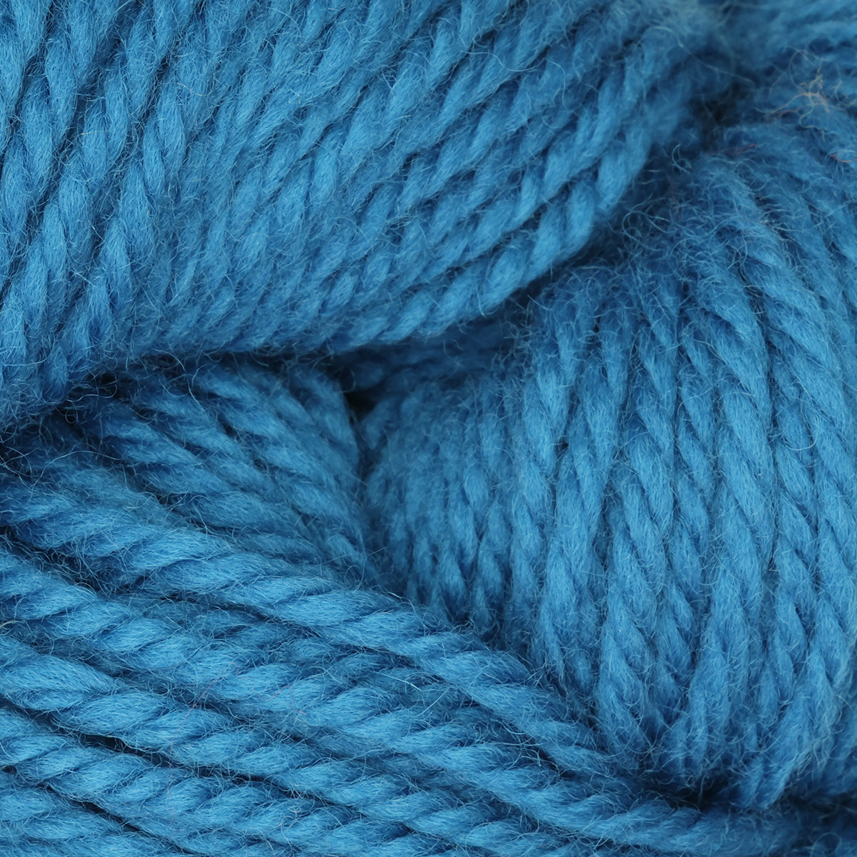 Skein of island blue hand-dyed wool punch needle yarn