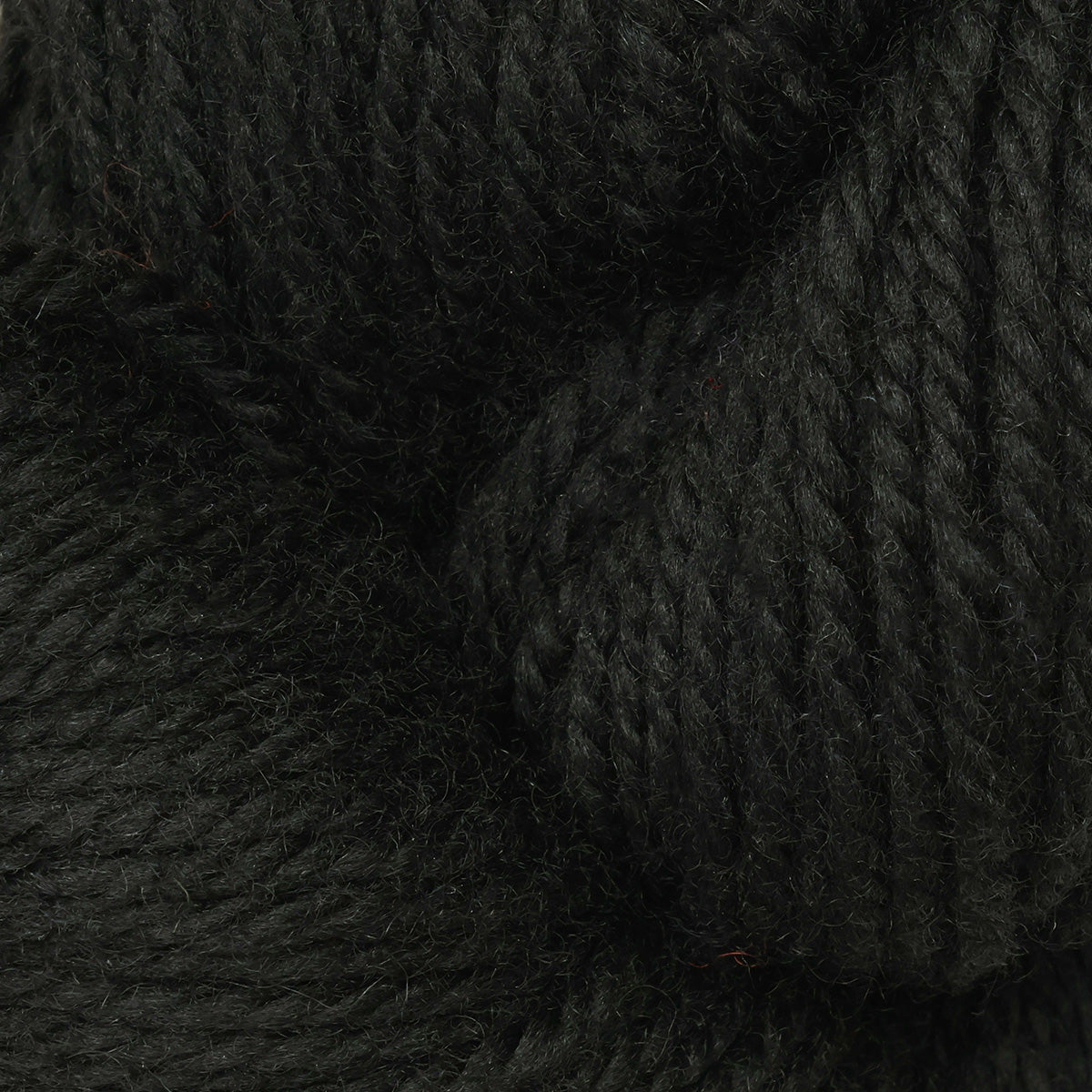 Skein of black hand-dyed wool punch needle yarn