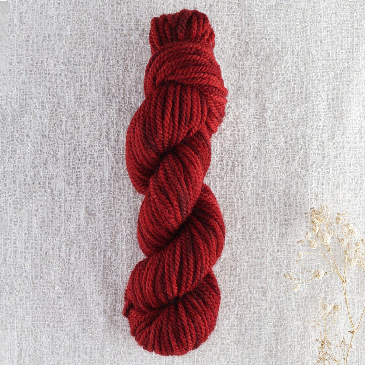 Skein of variegated Barn rug weight punch needle wool yarn