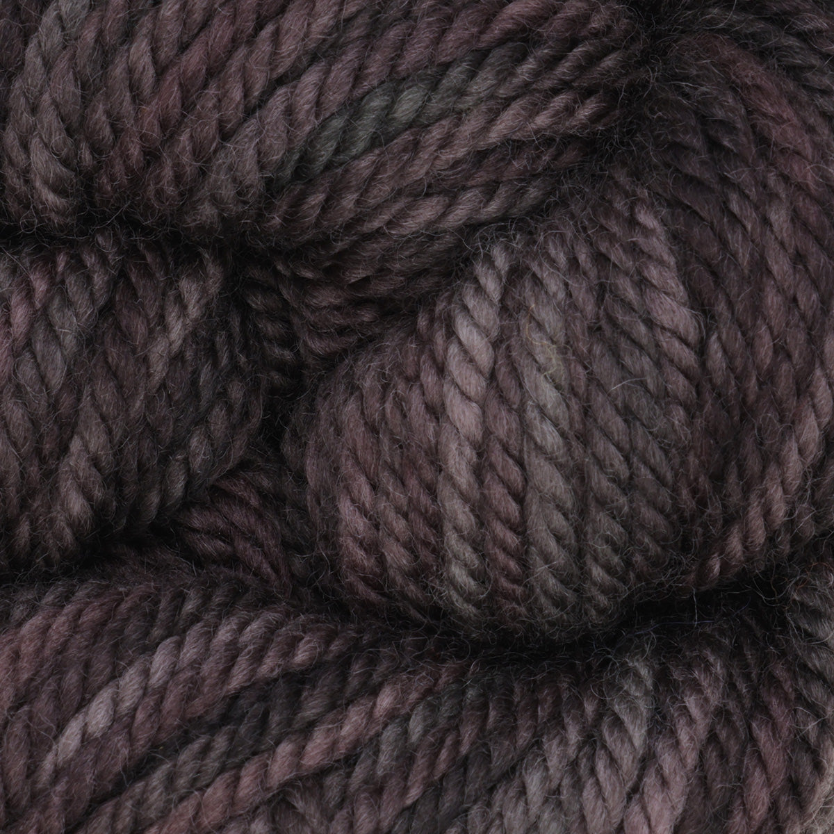 Skein of variegated Black Rhino rug weight punch needle wool yarn